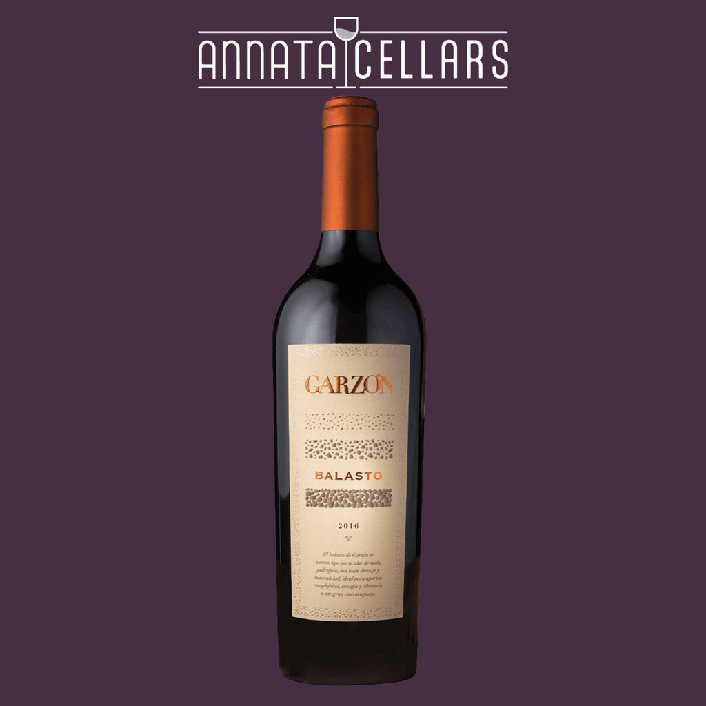 Garzon Balasto wine bottle with cream label and orange foil