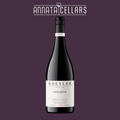 2022 red wine bottle with dark glass and cream label