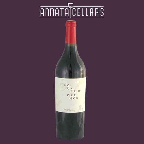 Wine bottle with red foil cap and dark glass, cream label with vertical text
