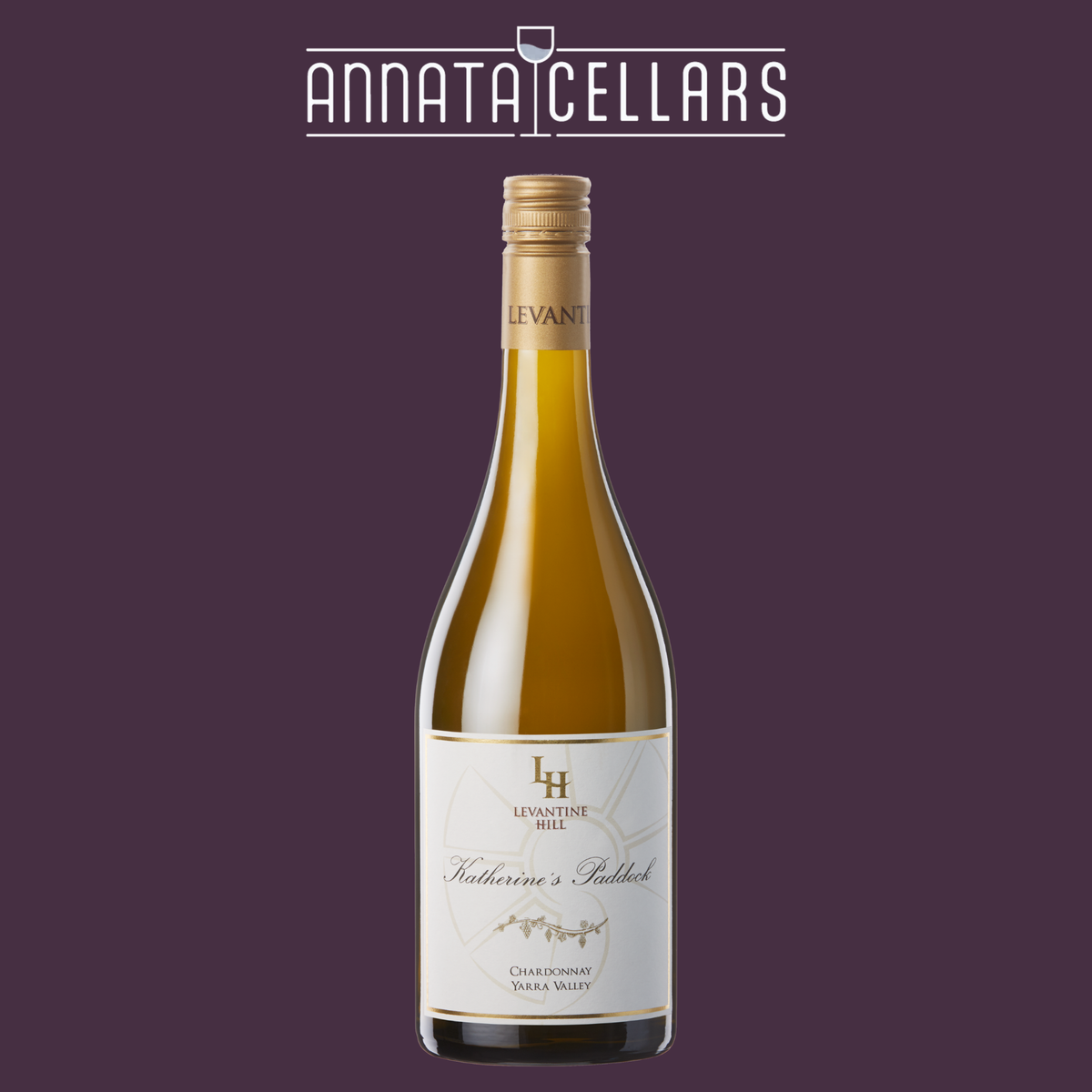 Chardonnay wine bottle with gold cap and cream label