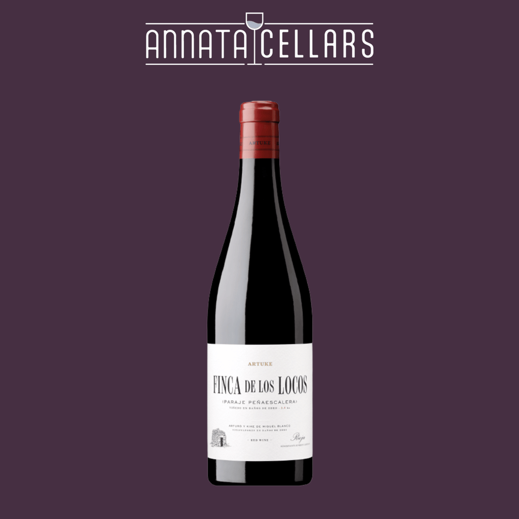 Rioja Tempranillo wine bottle with red capsule and Finca de los Locos label