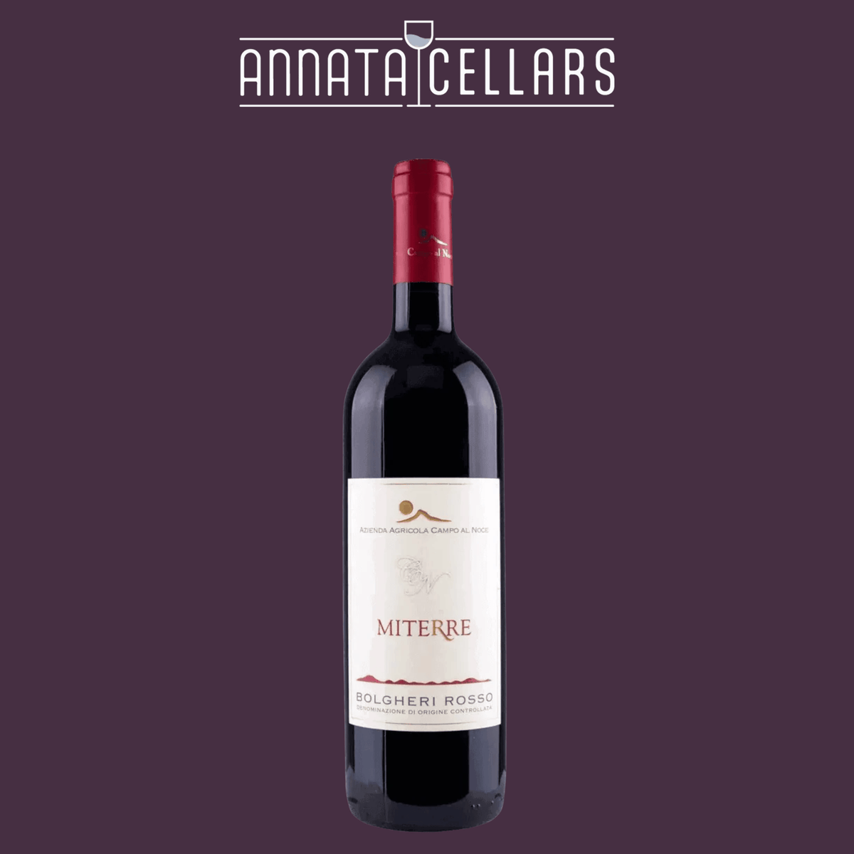 Red wine bottle with black glass, white label, and red foil cap