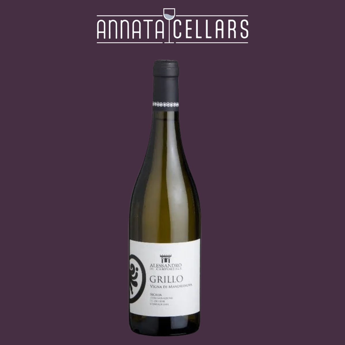 White wine bottle with foil-wrapped cork and label featuring a grape emblem