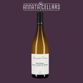 White wine bottle with black cap and cream label reading Domaine Cornu