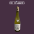 Gold wine bottle with white Savennieres label and AnnataCellars logo