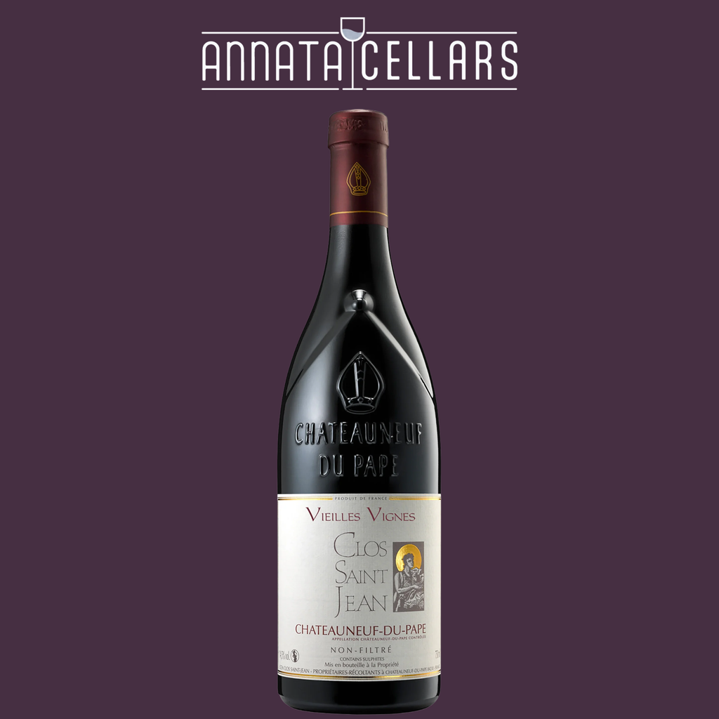 Red wine bottle with dark foil top and front label, full view