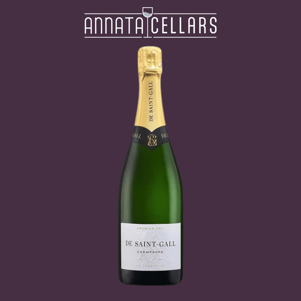 Champagne bottle with green glass and gold foil cap, white label on front