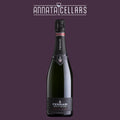 Champagne bottle with dark label and black foil cap
