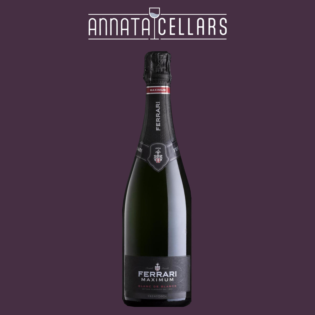 Champagne bottle with dark label and black foil cap
